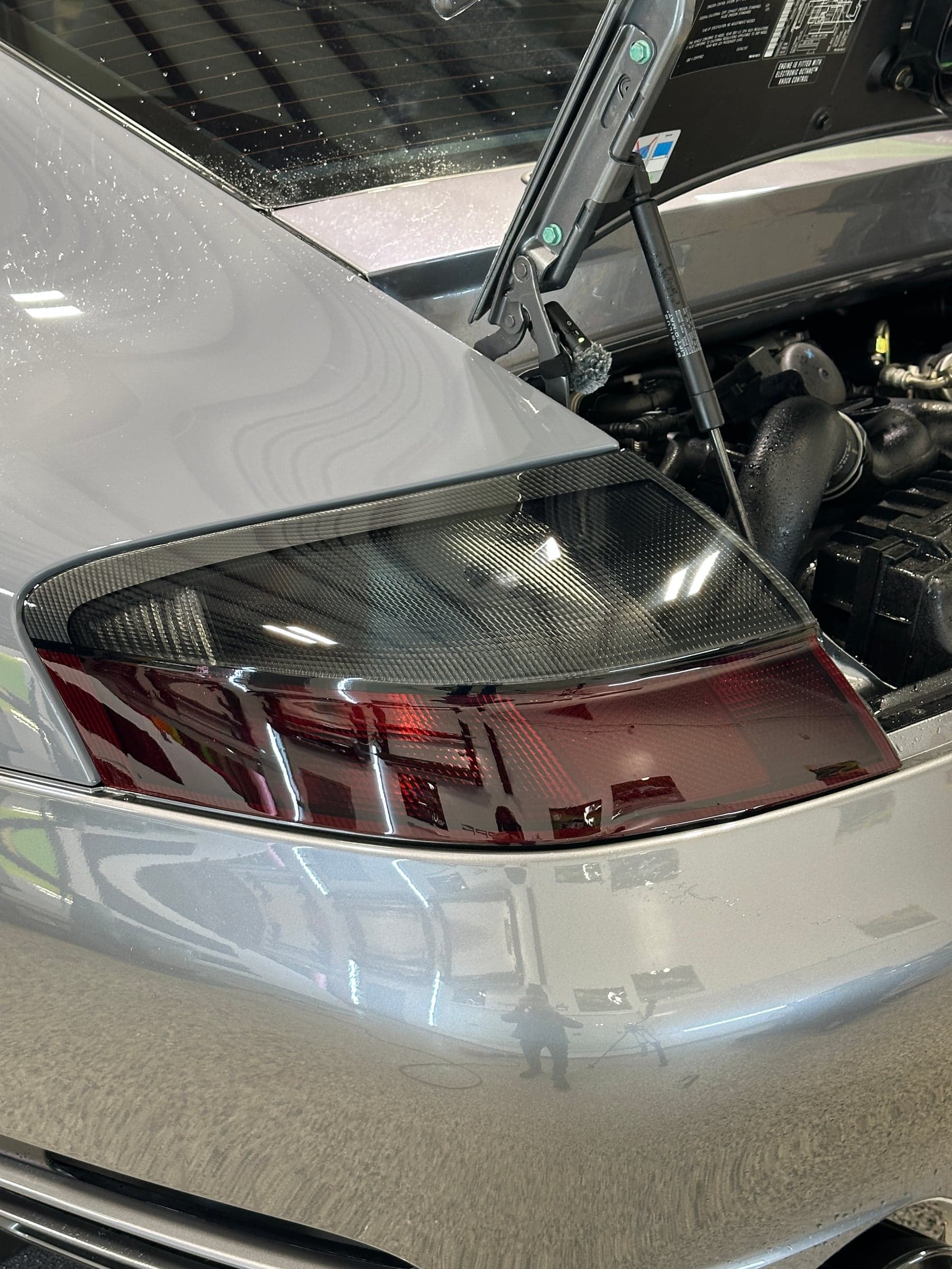 Vehicle lens finished with deep smoke protection film