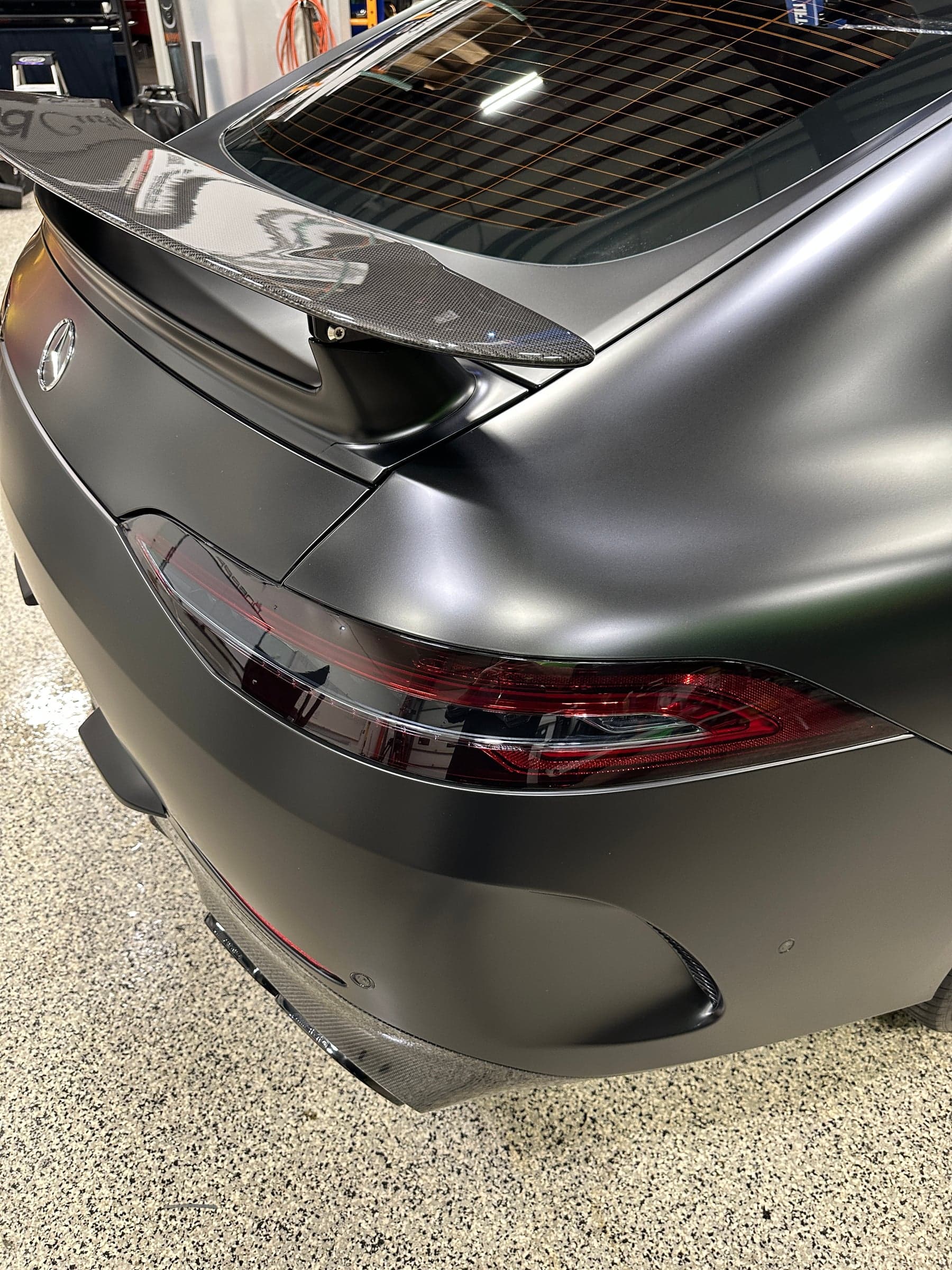 Mercedes-AMG taillight protected with dark smoke lens film